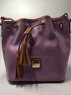 Dooney & Bourke Pebble Grain Kendall Crossbody Bag in a purple shade. 